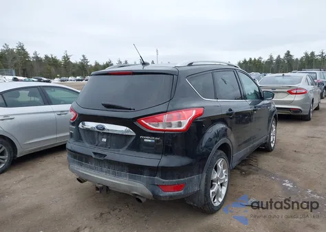 2014 Ford Escape Titanium z USA, uszkodzony, nr VIN 1FMCU9J93EUD97735